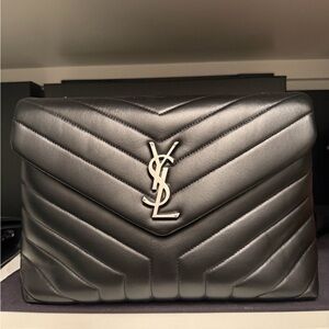 Saint Laurent Black Leather Interior with Silver Zipper